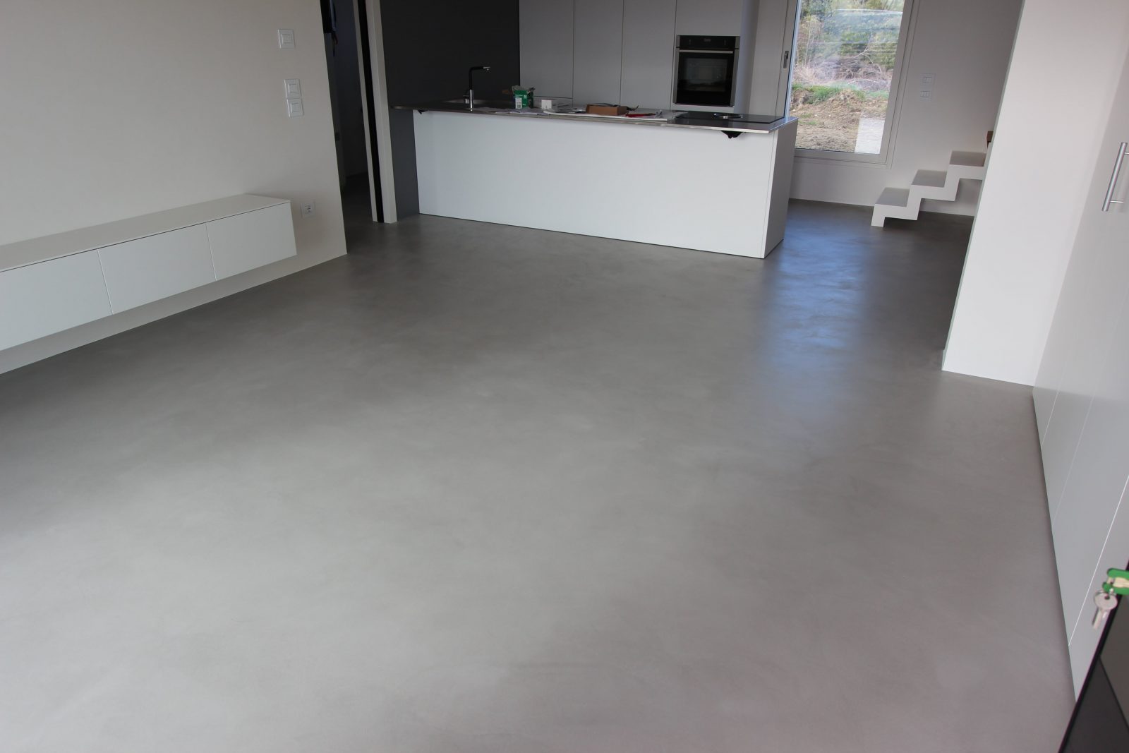 rivestimento cementizio con componenti natuali e terre colorate